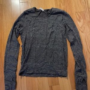 Lululemon long sleeve shirt. Color grey. Size 4.